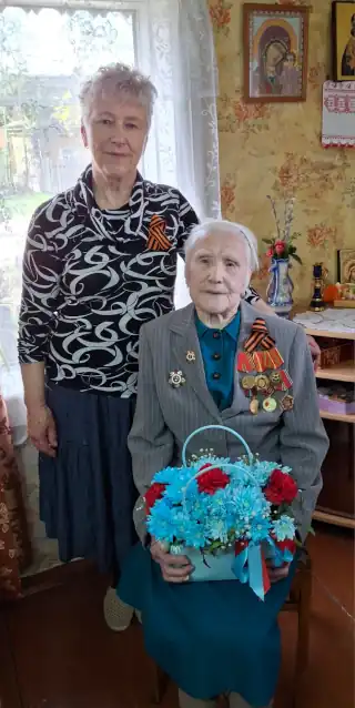 K.V. Zapevalova with her daughter Rita